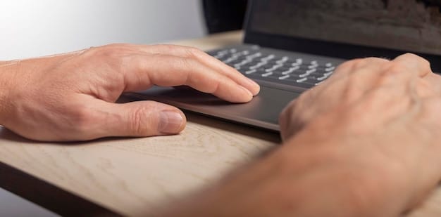 A close-up of a person's hands on a keyboard, focused on the keywords being typed into the Google Ads interface, surrounded by analytics charts and graphs displaying campaign performance in the US market.