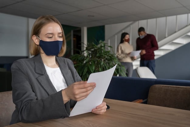 A person handing over an insurance policy document to a freelancer in a modern office setting, symbolizing the protection offered by insurance. The scene is professional and reassuring.