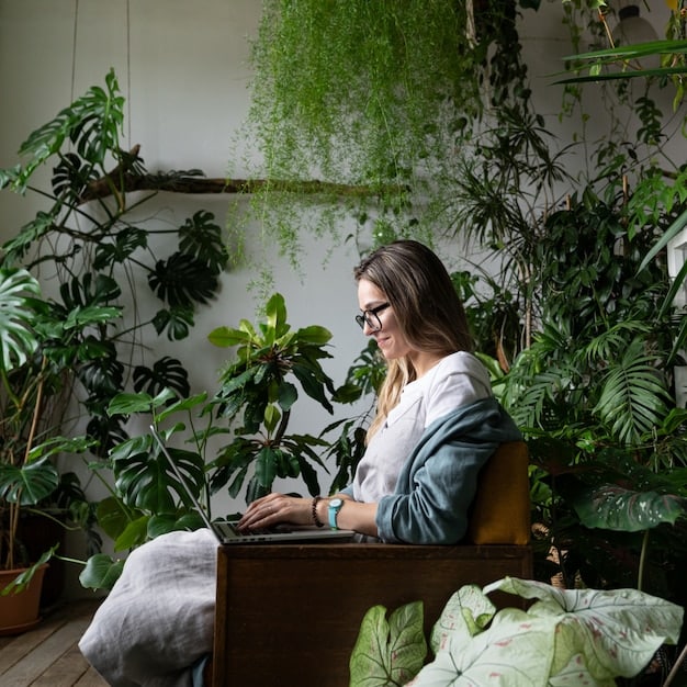 A person working comfortably from home, surrounded by plants and natural light. The scene represents the flexibility and work-life balance achievable through freelance side hustles.