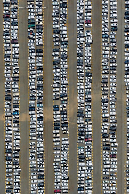 A split image: one side showing a car dealership with less foot traffic, and the other side showing a crowded grocery store aisle, symbolizing shifts in spending patterns.