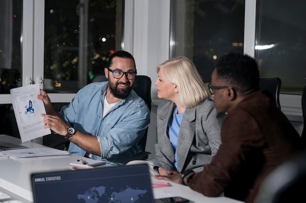 A diverse group of business professionals in a modern office looking at charts and discussing financial data, with one person pointing to a graph showing rising costs, illustrating the impact of interest rates on businesses.