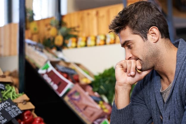A worried person looking at grocery prices in a supermarket, indicating consumer price sensitivity and inflation's impact on daily spending.