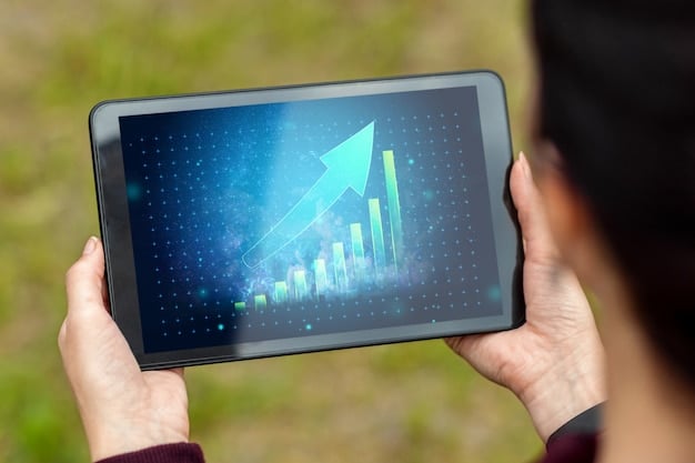 A close-up shot of hands holding a tablet displaying financial charts and graphs related to bond yields and market trends. The background shows a dimly lit office environment with other financial documents and a laptop, emphasizing analysis and data.