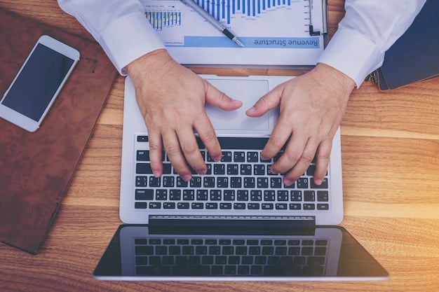 A person's hands typing on a laptop keyboard, with a financial planning software or website visible on the screen, showing various investment options and account balances. The setting is a home office, and the atmosphere suggests focused online research and management.