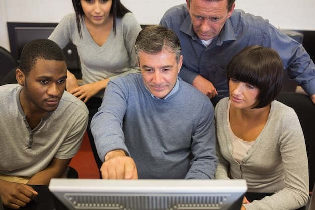 A diverse group of adult learners engaged in a modern classroom setting, utilizing tablets and computers, symbolizing the ongoing efforts in reskilling and upskilling the US workforce for future jobs.