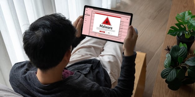 A person's hand interacting with a digital tablet displaying security warnings and a web browser with a phishing email, emphasizing the need for vigilance and awareness against cyber threats.